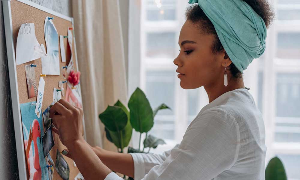 A girl using Vision Board